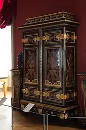 Baroque cupboard; by André Charles Boulle; c.1700; ebony and amaranth veneering, polychrome woods, brass, tin, shell, and horn marquetry on an oak frame, gilt-bronze; 255.5 x 157.5 cm; Louvre