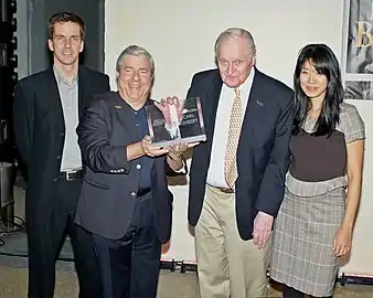 Ashbery accepts the "BoBi" Award. From left to right: Johnny Temple, Marty Markowitz, Ashbery, and Tina Chang.