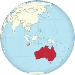 Location of Christmas Island (red circle) and the location of Australia mainland (continent in red)