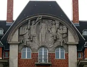 Art Deco pediment of the Carrefour Curie (Quai de Conti no. 1-3), Paris, by Joseph Marrast and Charles Letrosne, 1932