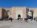 The vehicular entrances with the France door in the center