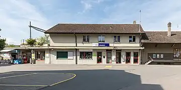 Two-story building with gabled roof