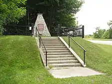 A federal cairn and plaque marks Battle Hill National Historic Site