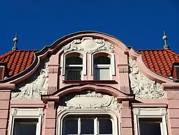 Stucco allegorical female figures