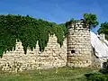 4th tower counting from Place du Château; the 5th is covered for protection during restoration (2011).