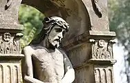 Detail of a 19th-century tomb in the church graveyard