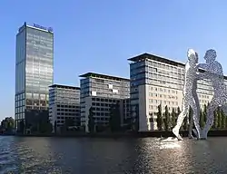 The building complex "Treptowers"  and the sculpture "Molecule Man"