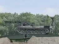 A Biber of the German Army using its own bridge