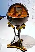 Globe-shaped work table; 1815–1820; maple veneer, bird's eye maple, fruitwoods, gilded and ebonized wood, mirror, brass; from Vienna; Montreal Museum of Fine Arts (Montreal, Canada)