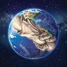 Planet Earth with two hands grabbing each other.