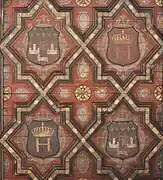 Henry IV courtyard, coats of arms under the awning. The geometric motifs evoke the Mudejar style, but also Serlio's engravings (redesigned after the Renaissance).