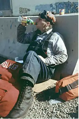 Executive 'Pronto' (Byron Mulver) taking a break during freight hoboing adventure ending 9/11/2001