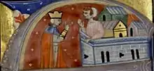 A man on the walls of a town speaks with a crowned man standing by the walls