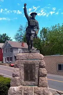 Sculpture entitled Over the Top by John Paulding in Bolton Landing, New York.