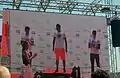 Medalists on the podium at the 2016 Swim seen on the mega screen.