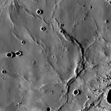 Dorsa Geikie is a prominent wrinkle ridge in Mare Fecunditatis.  LRO mosaic.