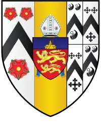 A shield blazoned as "Tierced in pale, Argent, a chevron sable between three roses gules seeded or, barbed vert; or, an escutcheon gules, two lions of England in pale or, on a chief azure Our Lady crowned seated on a tombstone issuant from the chief, in her dexter arm the Infant Jesus, in her sinister arm a sceptre, all or, ensigned with a mitre proper; quarterly, first and fourth argent, a chevron between three bugle-horns stringed sable, second and third argent, a chevron between three crosses crosslet sable."