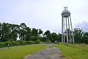 A grassy plateau and water tower