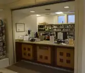 A wood and granite library checkout counter