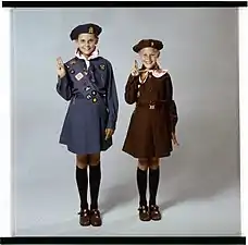 A Girl Guide and a Brownie wearing T-bar sandals in Canada, about 1975.