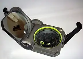  A compass with extra sights for measuring bearings.