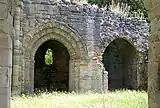 Exterior view through entrances of the two chapels in the south transept.