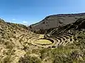 Ruins of a ring of terraces often incorrectly called a "bullring" or amphitheater; part of the Chivay Ruinas park overlooking Chivay, north side of Rio Colca