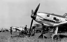 four Messerschmidt Bf 109 E of Fighter Wing 51 "Mölders" on a grass airfield