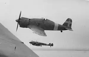 a single-engined monoplane in flight