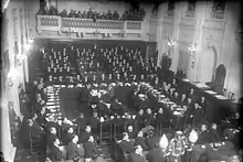 Great hall containing many people