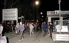 At Checkpoint Charlie on 10 November 1989.