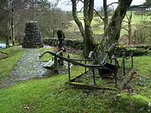 The Burns Cairn in Glen Afton. The inscription on the cairn says "Flow Gently Sweet Afton. Robert Burns 1759 - 1796. Erected by New Cumnock Burns Club (500) to mark its golden jubilee 1973."