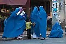 A group of burqa-wearing women in Herat