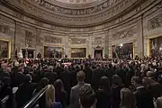 Mourners circumambulate the casket of George Bush during the lying in state on December 3, 2018.