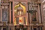 The tabernacle (center) and the lower region of the altar