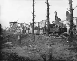 Australian 17th Light Railway Operating Company ballast train near Ypres pulled by Cooke 2-6-2 tank locomotive # 1217.