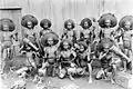 A group of young men at Adaut in Selaru, Tanimbar Islands, provably in the early 20th century.