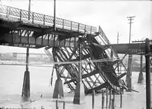 The fire caused a section of the bridge to collapse into False Creek.