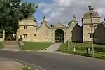 Lodges, gates and archway to Old Campden Manor