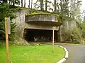 16 inch gun casemate, front view, where the gun was mounted. Note the red-colored projectiles.