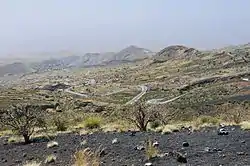 Panoramic view of the south of the island, on the left is Achada Furna and surrounding it are small hills.