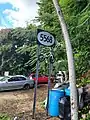 Sign for PR-5568 in Padilla, Corozal, heading north