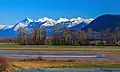 Cheam Range seen from the west near Chilliwack.L to R: Cheam, Lady, Knight (center), Baby Munday, Still, Welch.