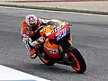 Casey Stoner riding his Repsol Honda RC212V at the 2011 Portuguese Grand Prix.