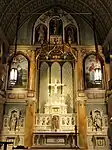 High altar with the painting of Saints Marianne and Damien, c. 2020