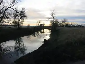 Caney Creek looking upstream at the FM 457 bridge in Cedar Lane