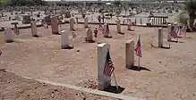  The Grand Republic of the Army area, located in the veteran's section of the graveyard, was decorated with flags to honor the veterans buried at Concordia Cemetery in El Paso, Texas, May 28. On Memorial Day, many visitors came to pay their respects to those who have served in the military.