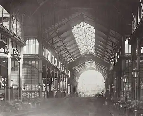 The interior of one of the giant glass and iron pavilions of Les Halles designed by Victor Baltard (1853-1870).