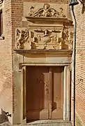 Door of the tower of the castle of Pibrac (decoration of 1540 attributed to Nicolas Bachelier, restored in 1902-1904).