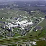 Space Shuttle Challenger atop its Shuttle Carrier Aircraft over JSC in 1983